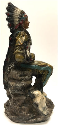 Native American Indian with Feather Headdress and Pipe Sitting on a Rock Next to Bison Skull 9"