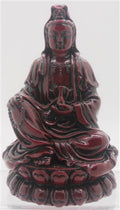 Kwan Yin Goddess sitting in a Lotus Flower